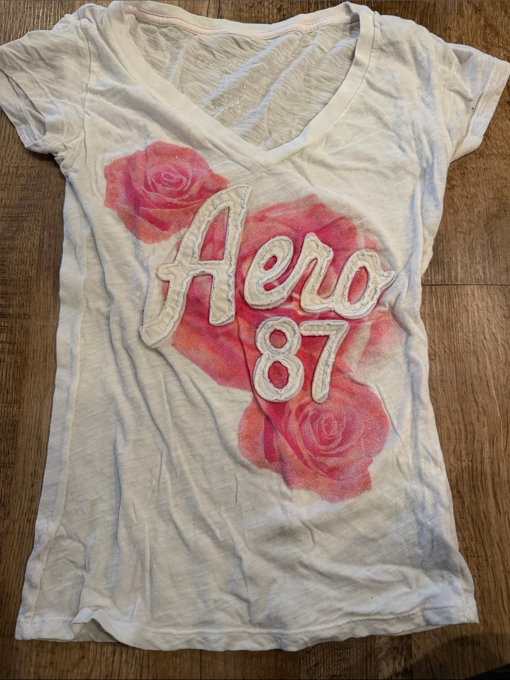 Aeropostale White V-Neck Tee with Pink Rose Graphic and Aero 87 Logo